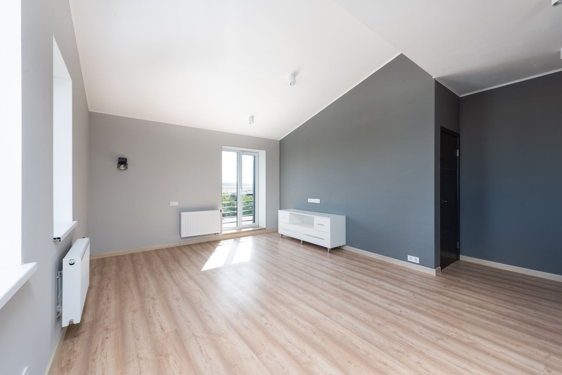 Bright, freshly finished interior room with clean painted walls
